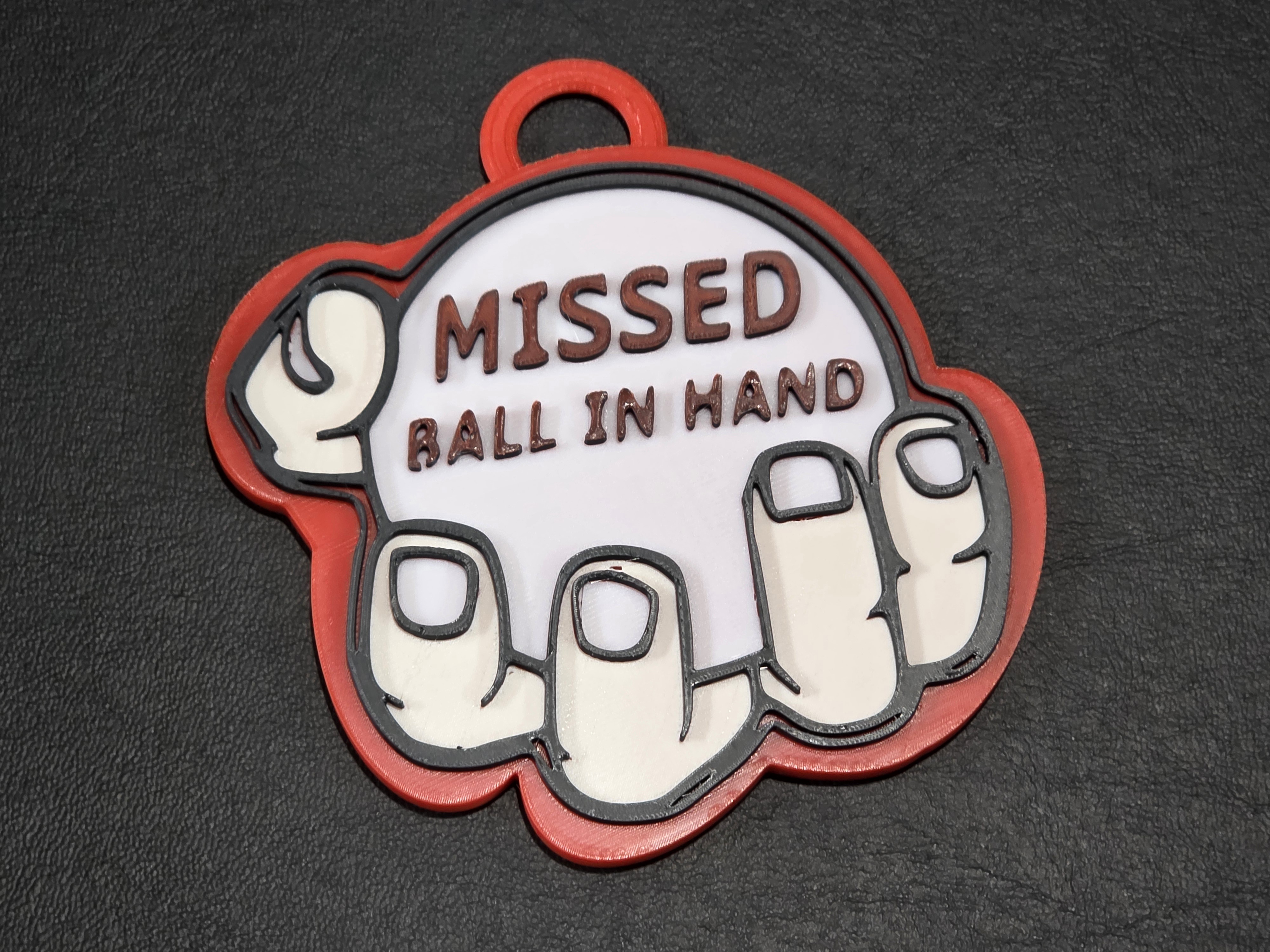 Missed Ball-in-hand pendant